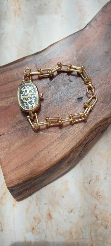 ساعت مچی زنانه النگویی طرح تیفانی با صفحه پلنگی رنگ طلایی (استیل ضد حساسیت)